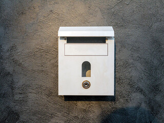 mailbox on cement background or concrete wall