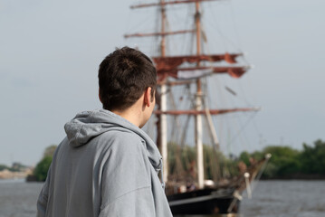 A man watching at an old ship