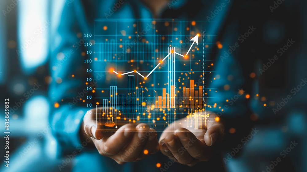 Poster a person is holding a screen that shows a graph with a line going up