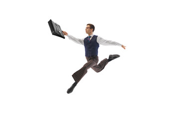 Motivated and ambitious businessman in formal wear, with briefcase running to work with energy and...