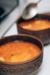 Red Ukrainian borscht on the table. Cooking the national first course