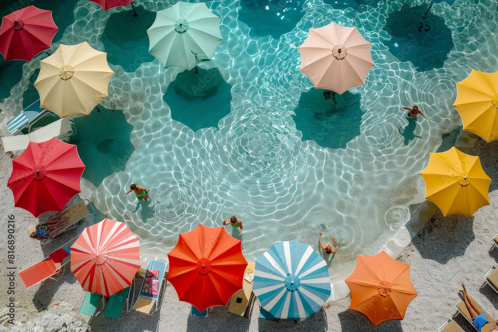 Aufkleber brightly colored umbrellas floating in a swimming pool, creating a vibrant and playful atmosphere