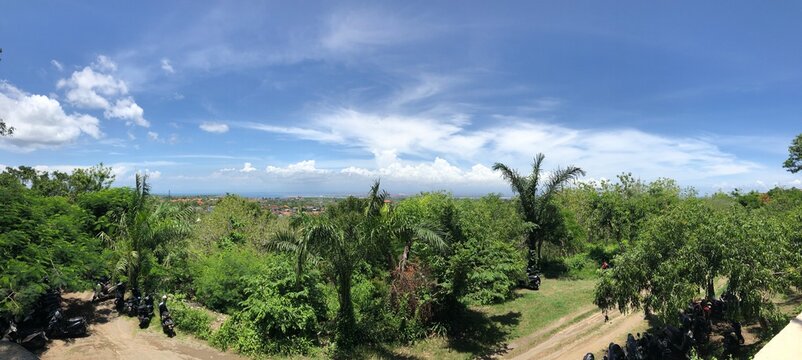 Panaromic view of Bali from Garuda Wisnu monument with blue sky and greenry