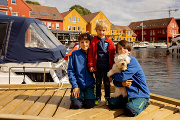Beautiful town Kristiansand in Norway, family visiting Norway for summer vacation