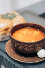 Red Ukrainian borscht on the table. Cooking the national first course