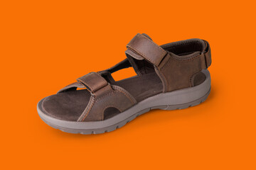 Hike sandal in leather on orange background