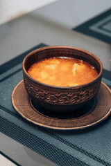 Red Ukrainian borscht on the table. Cooking the national first course