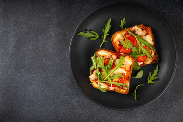 Tasty crunchy toasts pizza. Fast food, modern variation of portioned quick made pizza on toast...