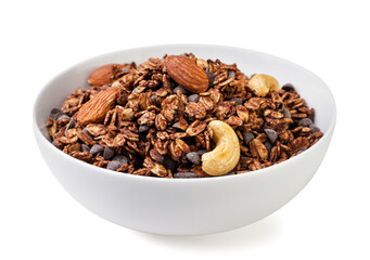 Chocolate granola with nuts in a plate close-up on a white. Isolated