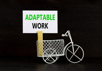 Adaptable work symbol. Concept words Adaptable work on beautiful white paper on wooden clothespin....