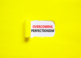 Overcoming perfectionism symbol. Concept words Overcoming perfectionism on beautiful white paper. Beautiful yellow paper background. Business Overcoming perfectionism concept. Copy space.