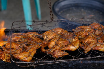 ayam bakar Taliwang is Taliwang grilled chicken is a typical food of Lombok and Sumbawa, West Nusa Tenggara. Spicy shrimp paste chicken. Indonesian food. 