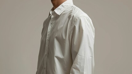Side Profile Mockup of a White Button Down Shirt Against Muted Backdrop