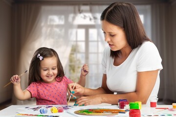 Mother and child painting art at home