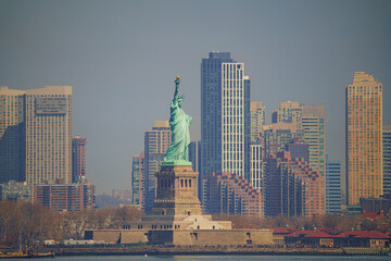 The Statue of Liberty - New york cityscape river side which location is lower manhattan....