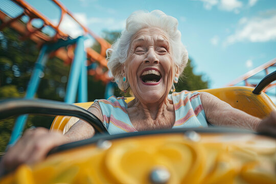 Senior woman experiencing the thrill of a roller coaster, defying age stereotypes with zest for life