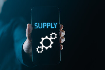 Using a smartphone, a businessman manages supply, logistics, and inventory, ensuring efficient product storage and direct communication with manufacturers for optimized industrial operations