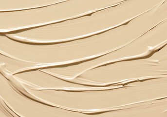  textured smears of beige cream. .