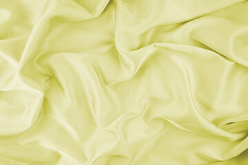 Yellow chiffon fabric texture for background.