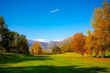 Golf Course Menaggio with Mountain View in Autumn in Lombardy, Italy.