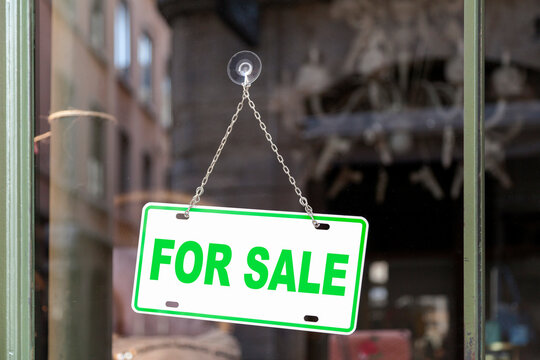 For sale sign in a shop window