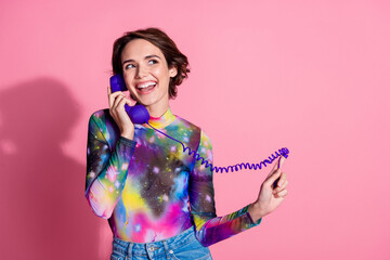 Photo of nice young woman talk phone wear pullover isolated on pink color background