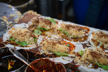 Popiah prepration in progress. Popiah is a Fujianese/Teochew-style fresh spring roll filled with an assortment of fresh, dried, and cooked ingredients