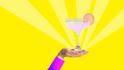 Hand holding Margarita cocktail on bright yellow background. Sweet and sour drink. Party. Contemporary art collage. Concept of summer vibe, surrealism, abstract creative design, pop art
