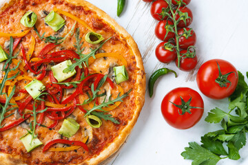 Classic italian vegetarian pizza in white wooden desk.Top view
