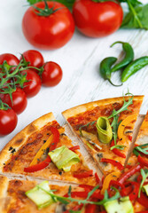 Classic italian vegetarian pizza in white wooden desk.Top view