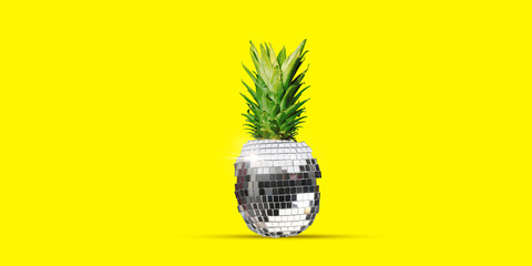 Disco ball with pineapple top against bright yellow background. Tropical party. Contemporary art collage. Concept of summer vibe, surrealism, abstract creative design, pop art