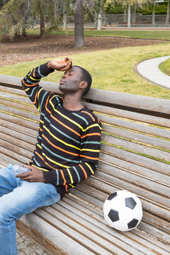 Young man experiencing hypoglycemia after soccer session