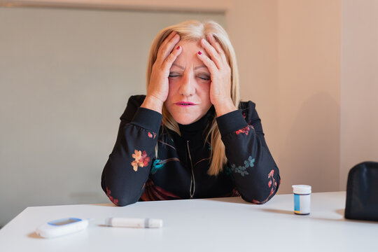 Middle-aged woman experiencing a moment of hypoglycemia