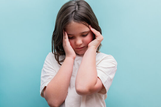 Young girl feels uneasy, possible hypoglycemia symptoms