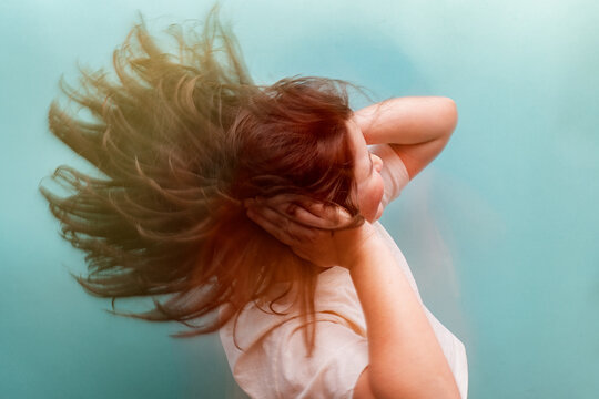 Woman struggling with dizziness, concept of hypoglycemia