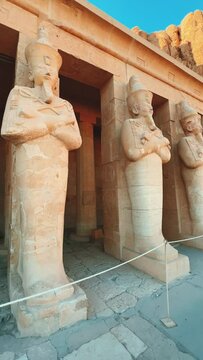 Egypt, December 20, 2022: The Mortuary Temple of Hatshepsut at Deir el-Bahri. Located near the cliffs of Deir el-Bahri on the west bank of the Nile, near the Valley of the Kings. Ancient temple. 4K