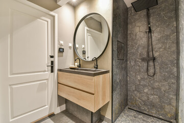 Modern bathroom design with sleek fixtures and natural tones