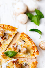 Tasty fresh baked pizza with champignons and chicken fillet