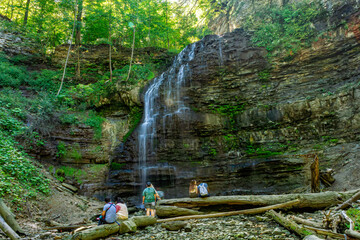 The Tiffany Falls in Spencer Gorge Conservation Area in Hamilton, taken with a low speed, showing the water and people in movement.