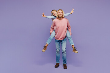 Full body young couple two friends family man woman wear pink blue casual clothes together giving...