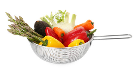 Metal colander with different vegetables and avocado isolated on white