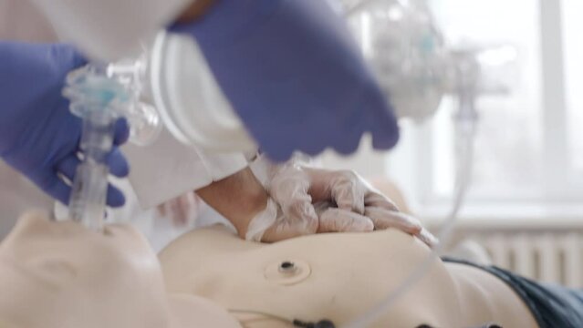 Training in first aid, oxygen mask and indirect heart massage