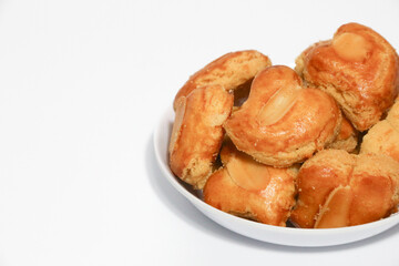 peanut almond cookies topped with sliced peanuts.