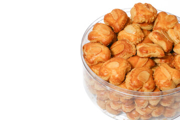 peanut almond cookies topped with sliced peanuts.