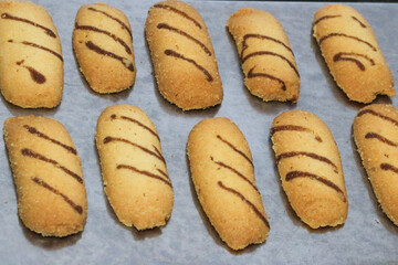 Kue lidah kucing or cat's tongue cookies. traditional cookies for eid holiday in indonesia. kue lebaran.
