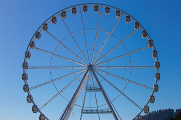 Ferris wheel on a sunny day.
