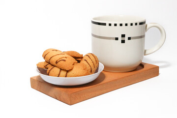 Kue lidah kucing or cat's tongue cookies. traditional cookies for eid holiday in indonesia. kue lebaran.