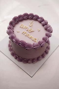 Elegant lavender cake with intricate icing design