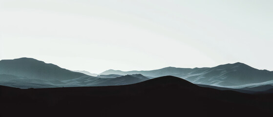 A minimalist mountain range with a clear blue sky in the background