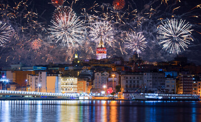 Fireworks over Galata Tower, Galata Bridge, Karakoy district and Golden Horn at morning, istanbul -...